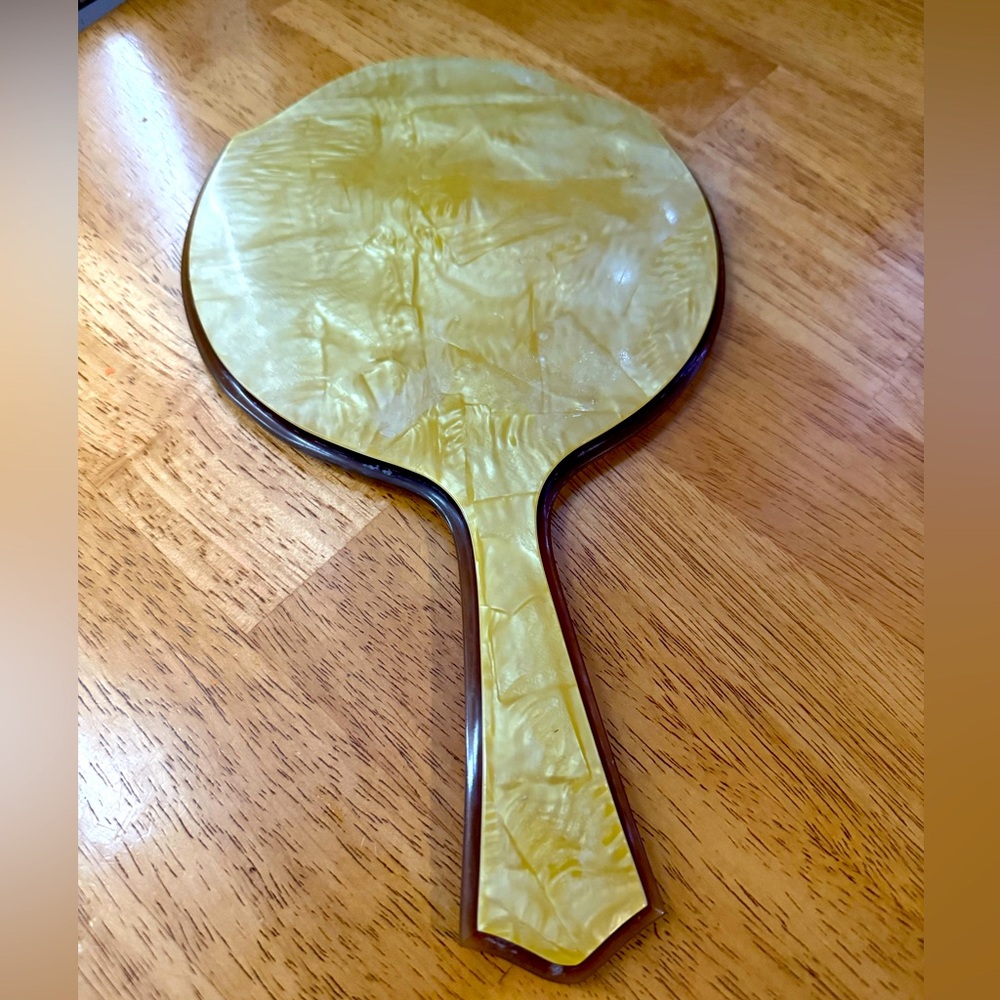 Vintage marbled gold lucite hand mirror 11” long 6 1/2 “ wide